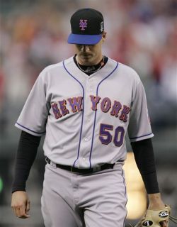 Photograph of reliever Sean Green after walking in the losing run by Tom Mihalek/AP